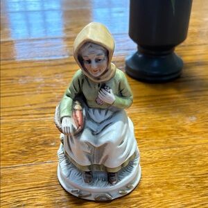 HOMCO vintage Home Interiors bisque porcelain figurine.  Old woman on bench.